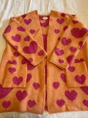 Anthropologie Orange Cardigan with Pink Heart Pattern